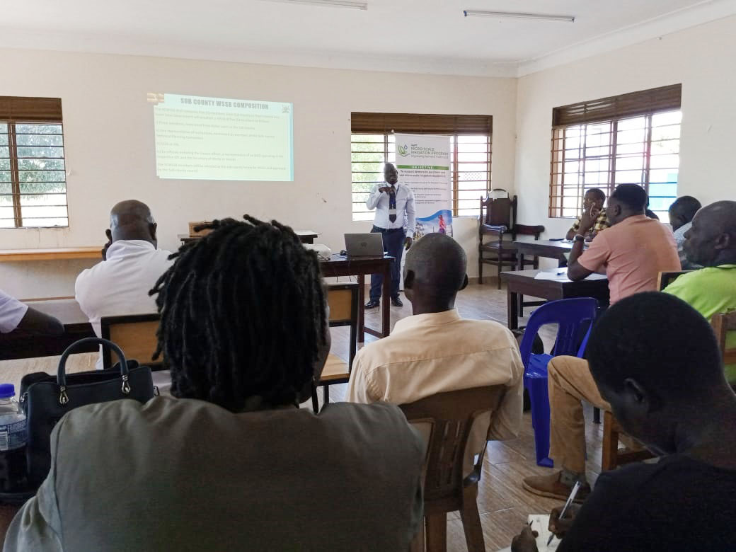 Simon Peter Omalinga, the senior socialogist from Ministry of water and environment diseminating new Operation and Maintenance Framework policy to Kapelebyong district stakeholders last week. Photo by Emmanuel Opio