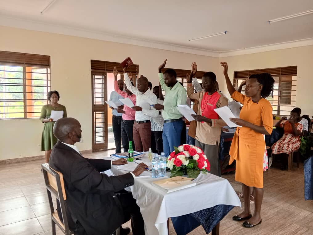 he new employs of Kapelebyong district taking oath which was administered by Mr. Shaineh Nelson, the deputy CAO (sitted) in district council hall on Wednesday last week. Photo by Emmanuel Opio