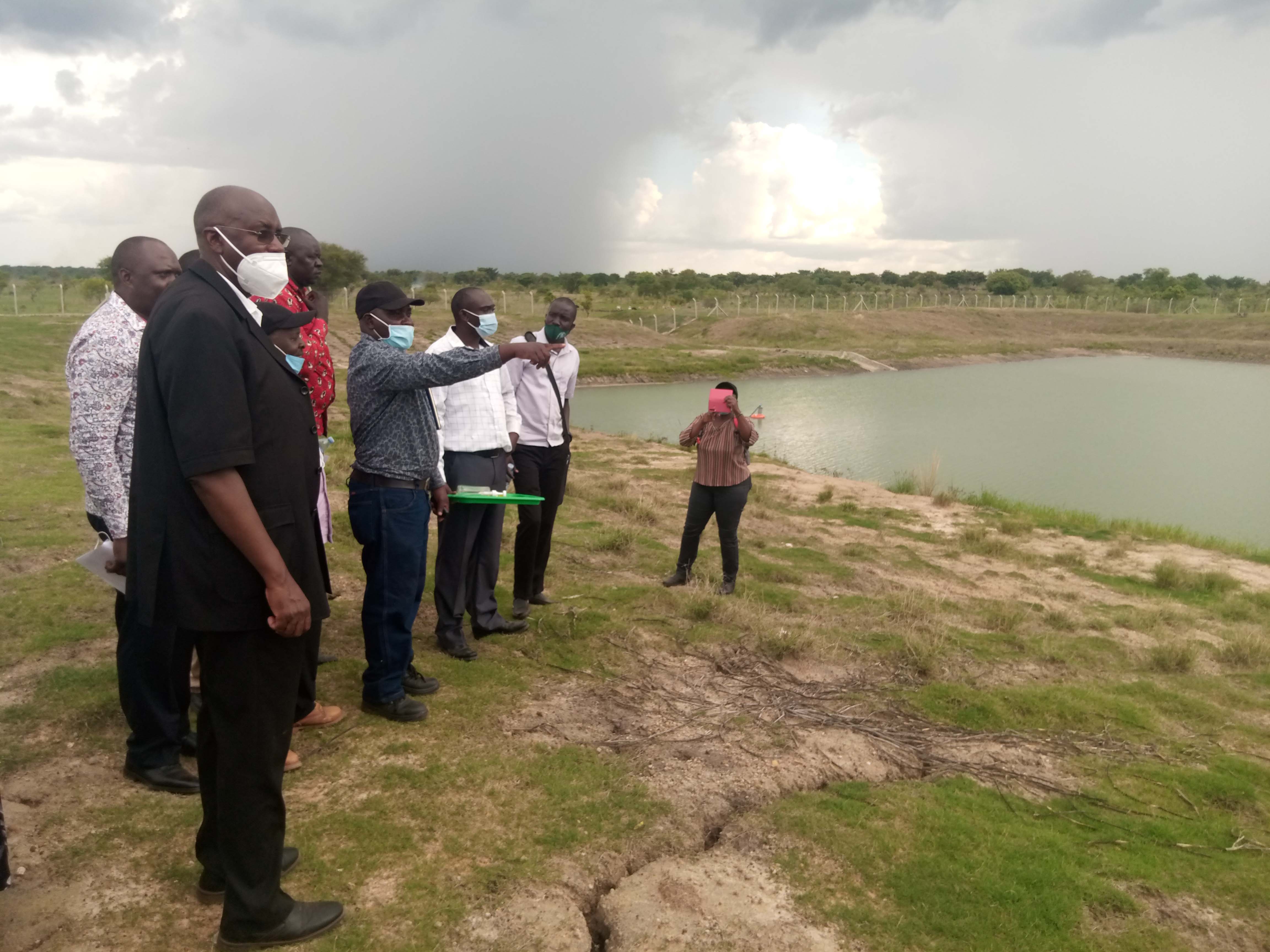 State Minister for Animal Industry and other leaders looking at the valley dam State Minister for Animal Industry and other leaders looking at the valley dam